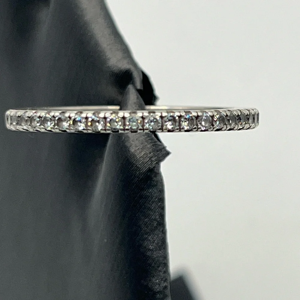 Sterling silver eternity bad with colorless stones. S - Picture 1 of 3